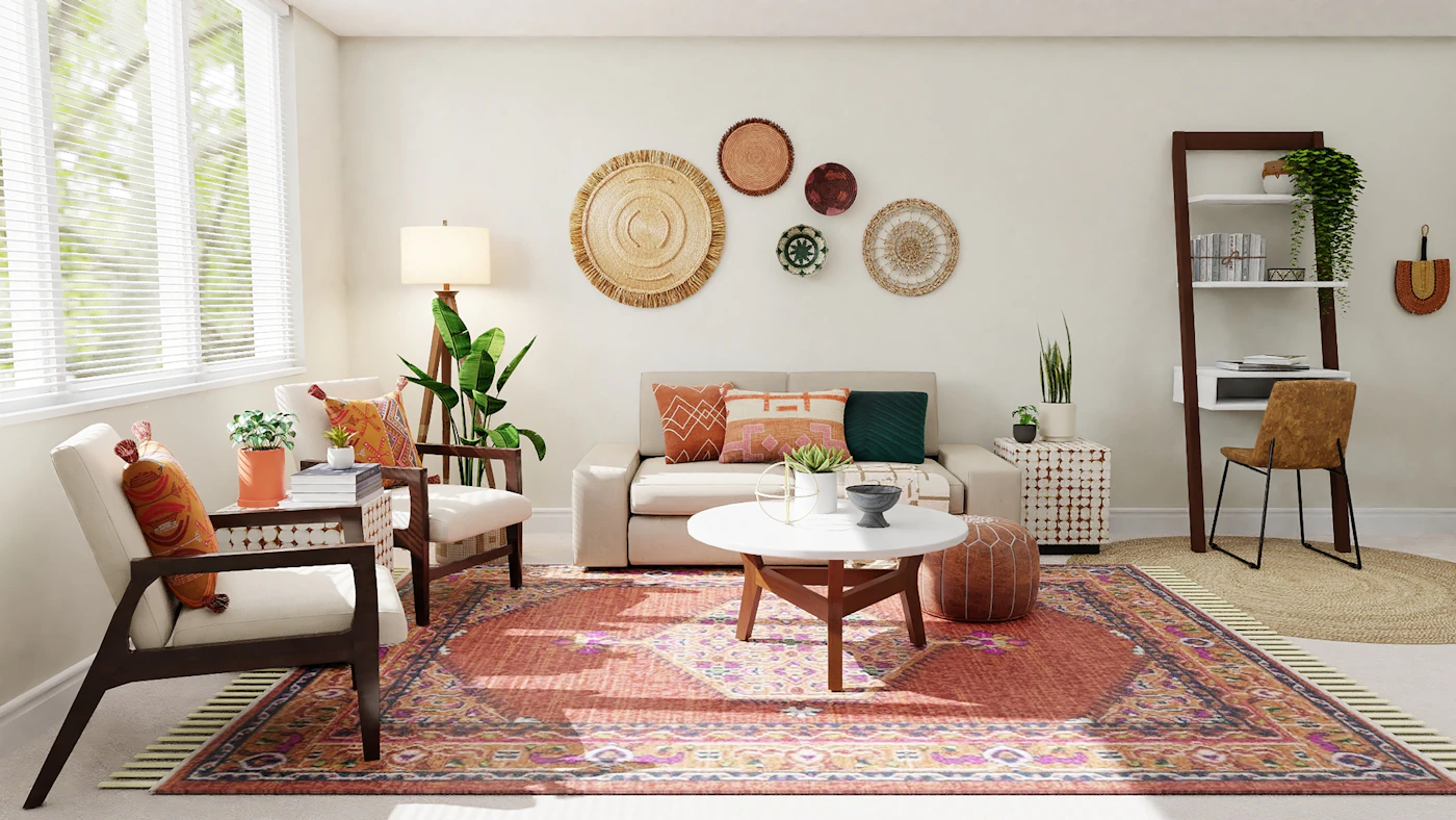 Salón cálido con alfombra de tonos rojizos, butacas y platos decorativos en la pared
